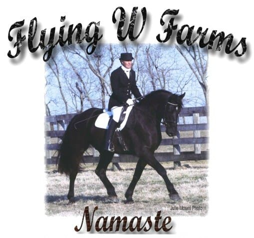 A person riding a black horse in an outdoor area with the text "Flying W Farms Namaste" above and below the image.